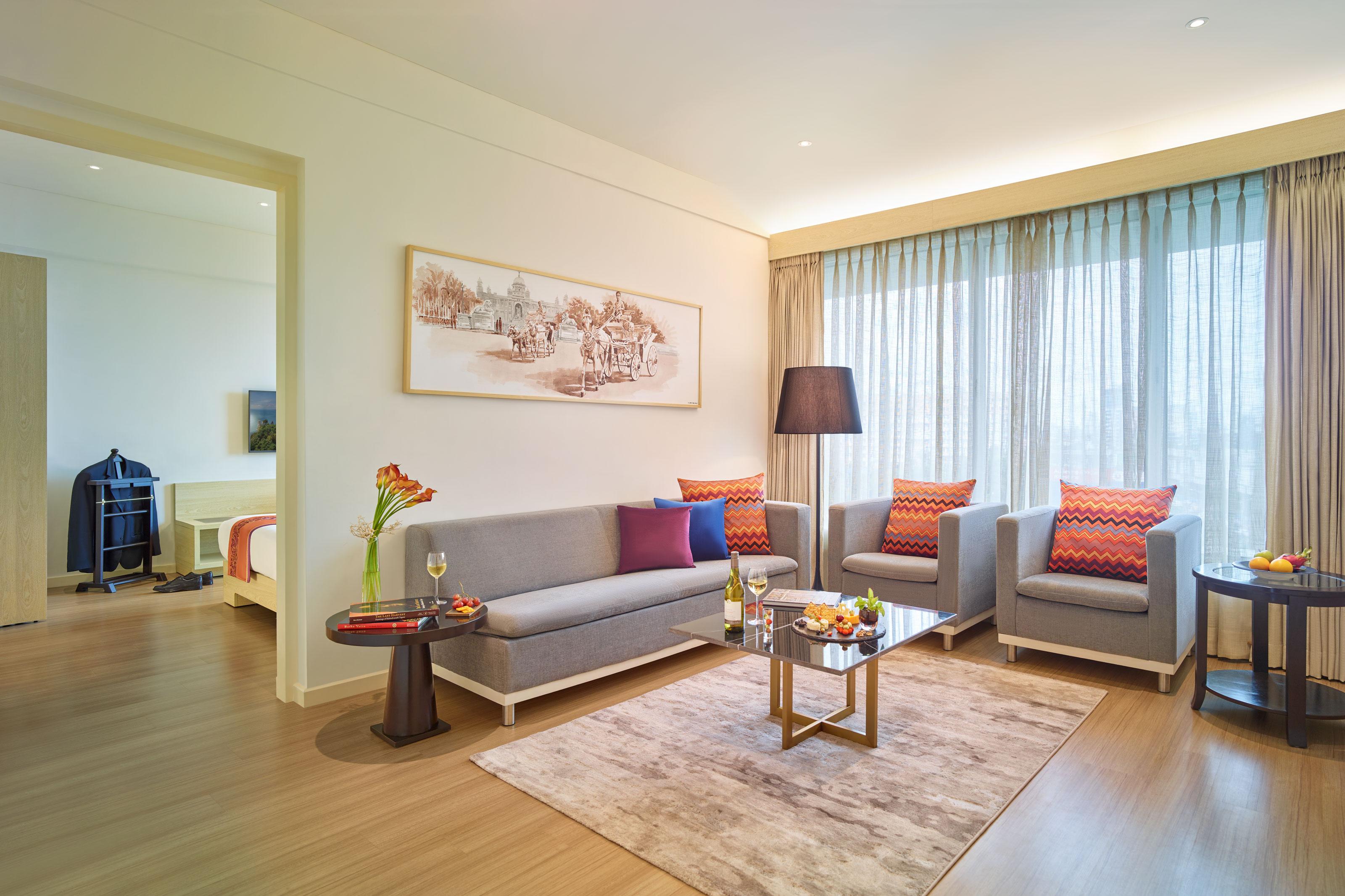 Vivanta Kolkata Em Bypass Exteriör bild A living room in a serviced apartment in Beijing, China